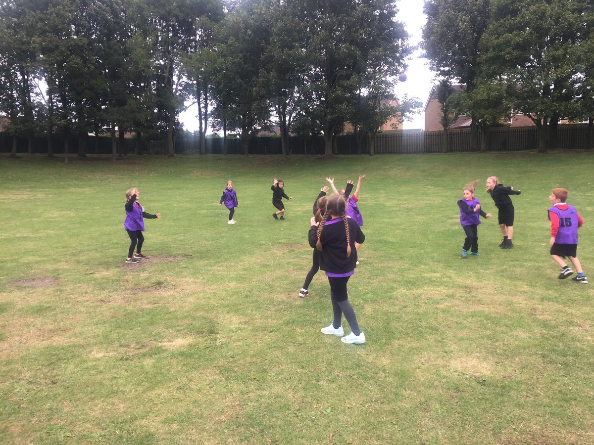 Beech class enjoying small sided games of handball as part of PE.