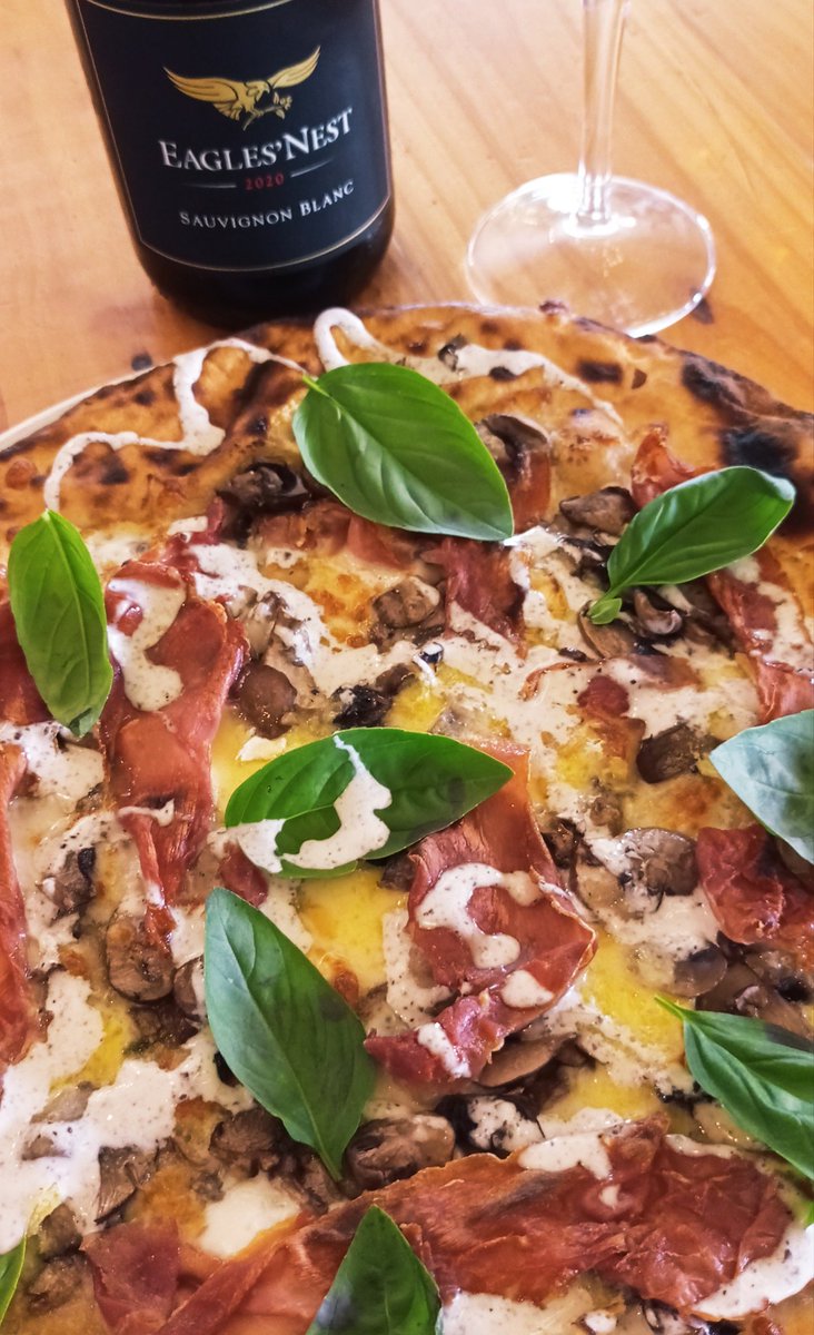 Alba is a small town in the Piemonte region of north Italy, well known for the truffles. This is our Alba pizza, on a white base brushed with garlic butter, brie cheese, cooked Parma ham, panfried mushrooms &amp; truffle cream.
Well paired with a local Eagle's Nest Sauvignon Blanc.