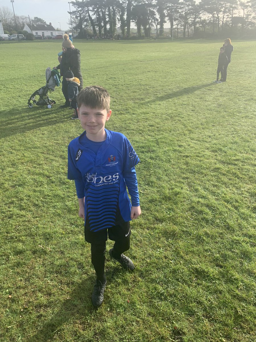 Proud moment with his first game, wrong colours but a great start 🏉🏉