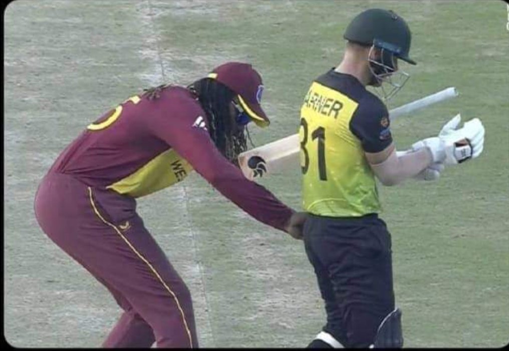 zakrm018's tweet photo. Has Chris Gayle just checked Warner's packet for sandpaper🤣🤣 https://t.co/g1IOvNQmir