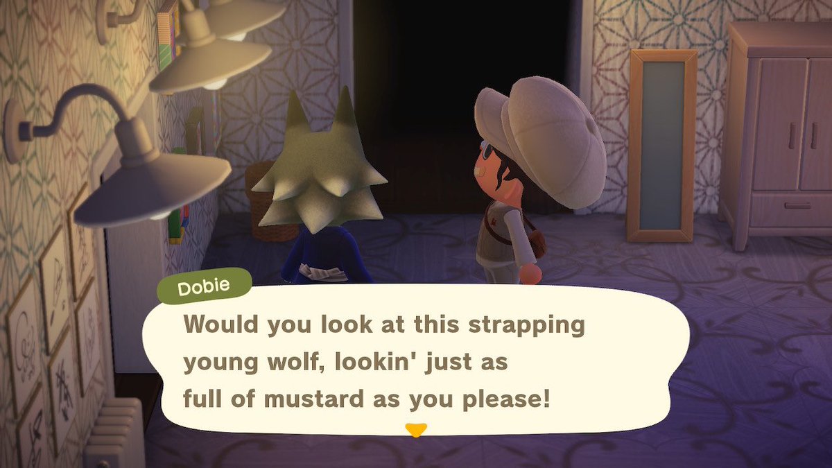 acgabli's tweet photo. omg dobie saw his photo on my wall 🥺😭 

#AnimalCrossingNewHorizons https://t.co/kJ6EVHFyWF
