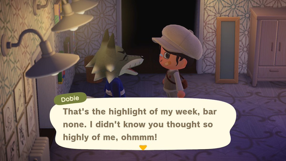 acgabli's tweet photo. omg dobie saw his photo on my wall 🥺😭 

#AnimalCrossingNewHorizons https://t.co/kJ6EVHFyWF