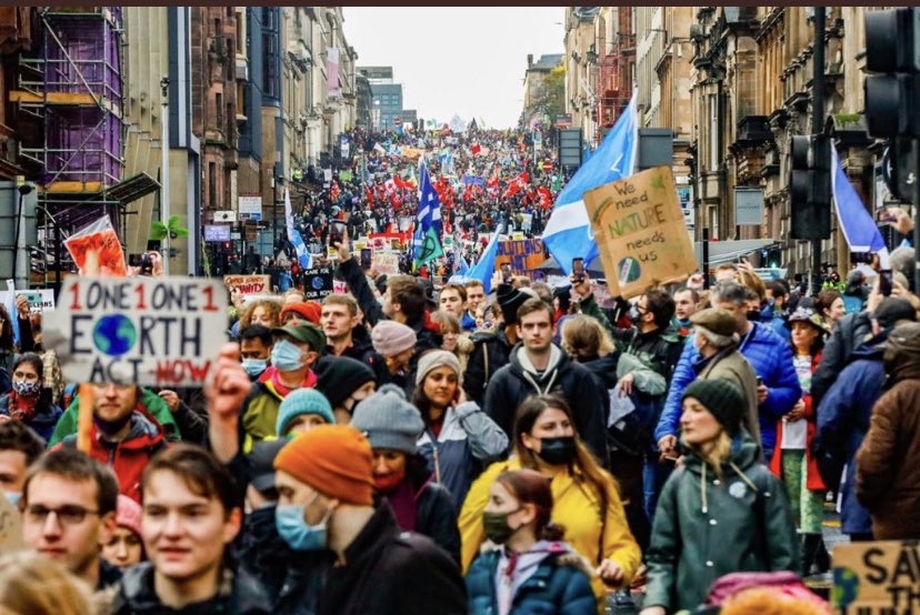 anna_lyndsay_'s tweet photo. Over 100,000 people marched for climate justice through Glasgow. We say enough is enough. No more green washing. Let’s have a proper just transition. Let’s give the most affected people and areas the reparations they need. Let’s work equitably. Let’s prioritise people not profit! https://t.co/wAX8S1AUY6