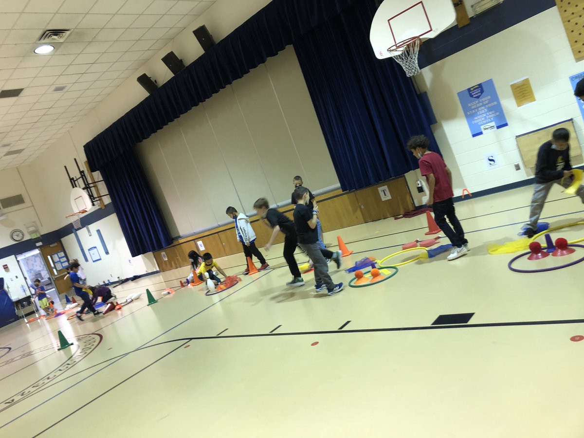 FitQuips's tweet photo. Hard to believe we were learning from home this time last year!

Now, back in-person this game becomes a cooperative relay race! The creative uses of PE equipment is a hit with all ages… https://t.co/UaECxgNryC