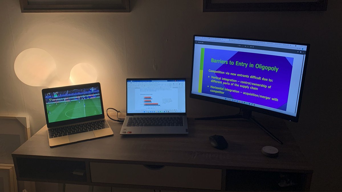 Sunday multitasking😎📚📈 #economics