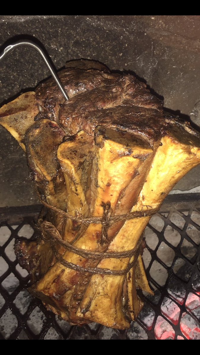 chrishofmeyr's tweet photo. Whole 2kg ribeye wrapped with split marrow bones and braaied low and slow #ratemybraai https://t.co/B7m1wBebow