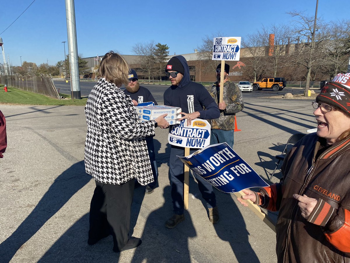nanwhaley's tweet photo. I come from a union family, so workers’ rights are personal for me. 

I was honored to stop by the @steelworkers Local 3057 picket line with some pizza to talk with striking workers in Shelby today. They deserve a fair contract and a governor that works for them. https://t.co/Q64Qo4s9Vk