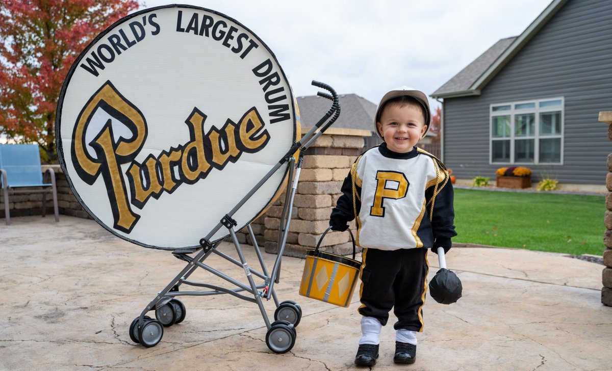 LifeAtPurdue's tweet photo. Halloween may have been a week ago, but we’re still not over this little #Boilermaker and his costume with The World’s Largest Drum™. Here's your newest Big Bass Drum Crew member, @PurdueBands! #BoilerUp https://t.co/jQSxLlHgML