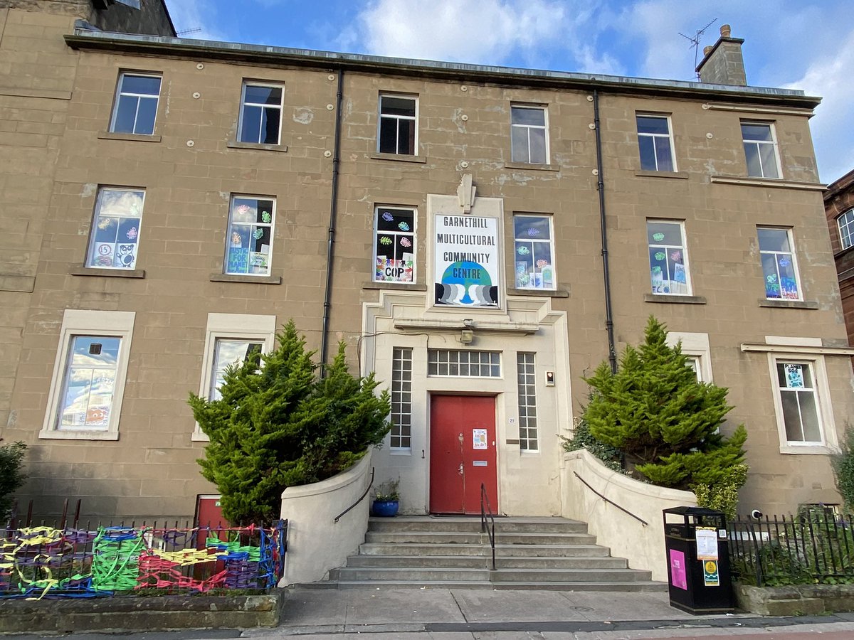 GarnethillMCC's tweet photo. @COHubClyde @PyramidAnderst1 @GovanhillBaths Yes, we are very proud community owners, please come and visit the multicultural centre. Our children’s art club have created a fab window display of COP26 posters & placards. Their hand sewn ‘Save the World’ banner now hangs with pride in our big hall. #communityowners😁 https://t.co/8ei8uAa9GS