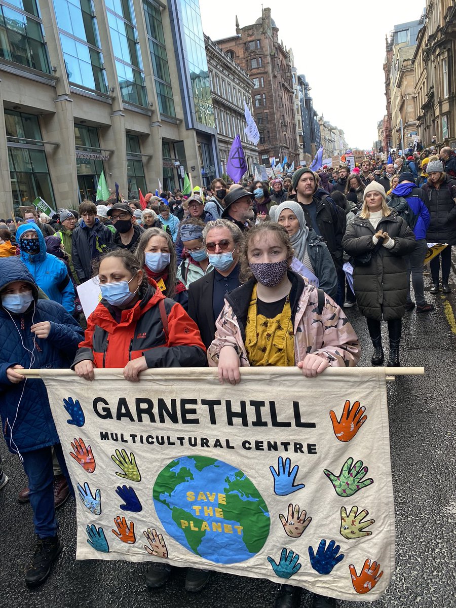 GarnethillMCC's tweet photo. @COHubClyde @PyramidAnderst1 @GovanhillBaths Yes, we are very proud community owners, please come and visit the multicultural centre. Our children’s art club have created a fab window display of COP26 posters & placards. Their hand sewn ‘Save the World’ banner now hangs with pride in our big hall. #communityowners😁 https://t.co/8ei8uAa9GS