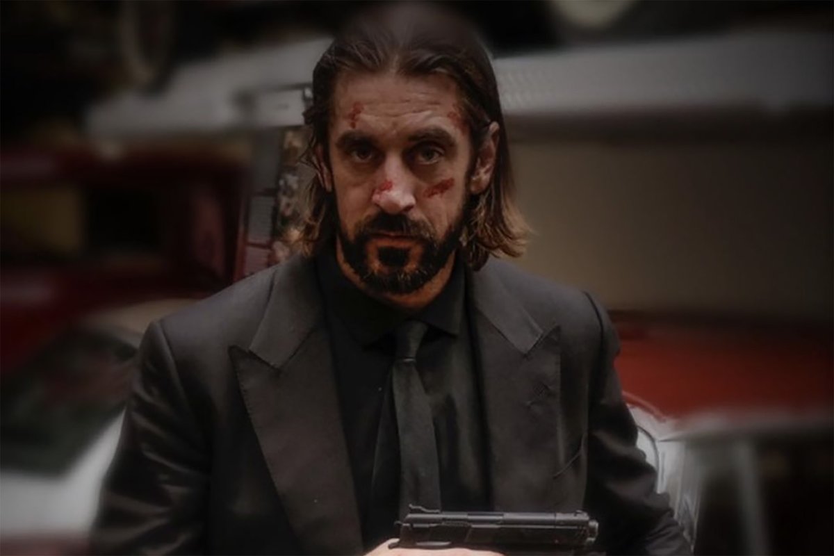 kent_swanson's tweet photo. Aaron Rodgers grew out his hair so he could dress up as John Wick at a Halloween party a week before they play the Chiefs, and all he got was COVID, a PR nightmare, a loss, and a costume that doesn't look like John Wick. https://t.co/LLhxYpJDn3
