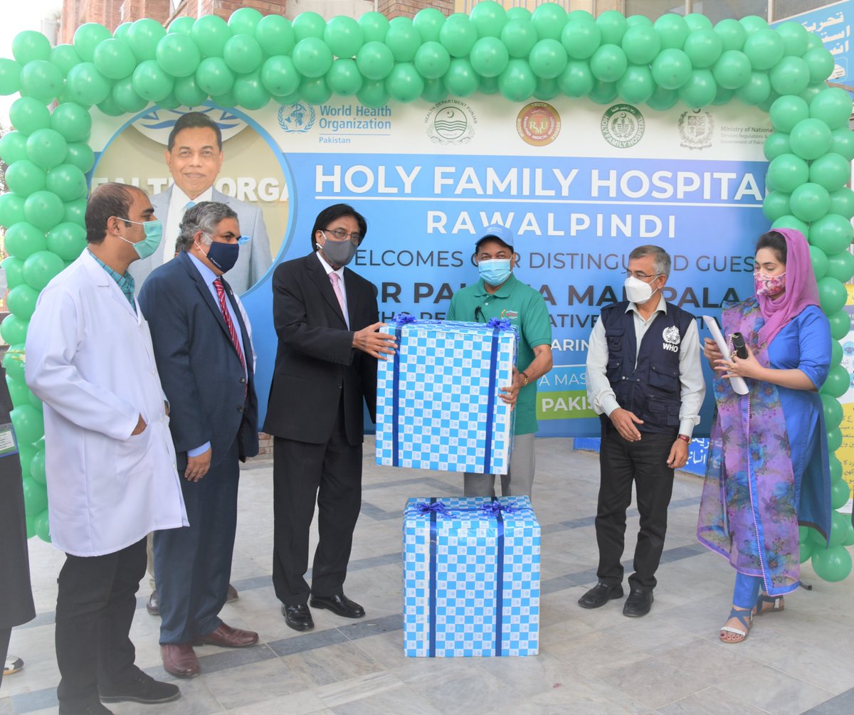 WHOPakistan's tweet photo. To encourage the people to continue following the COVID-19 precautionary measures despite the low number of cases, WR, Dr Palitha Mahipala &amp; WHO team distributed face masks &amp; IEC material among staff, patients &amp; their relatives in OPD of Holy Family Hospital. https://t.co/eaOyzjdMXM