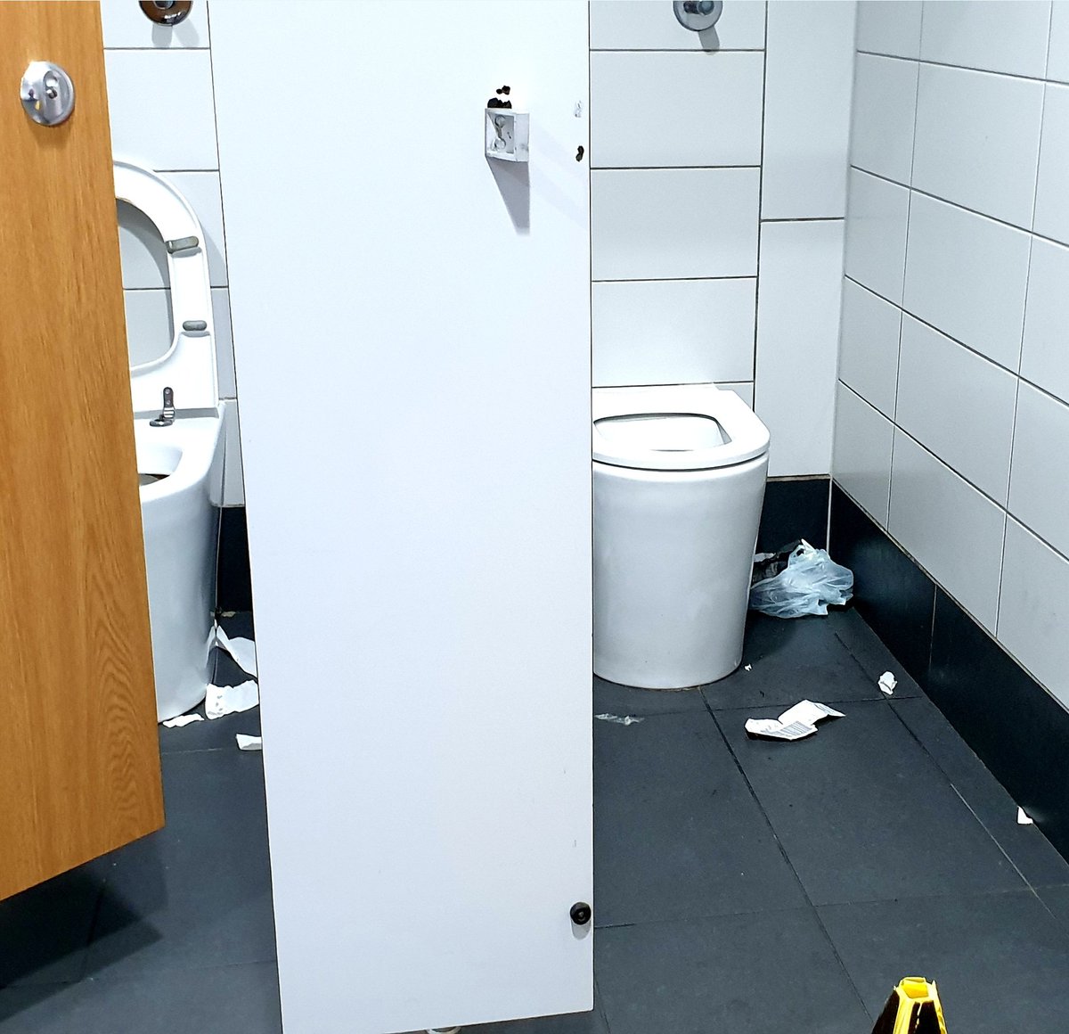 ByrneDavidM's tweet photo. Signs in @DublinAirport - 'We're working behind the scenes' to 'improve your #airport experience.' They could start with sufficient upkeep of the existing facilities. Consistently #disgusting, #DublinAirport toilets are #embarrassing &amp; a national disgrace. #ceadmilefailte indeed. https://t.co/w0zBo7dYZZ