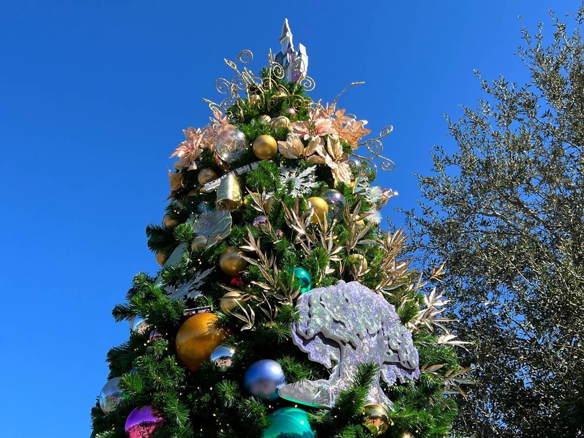 laughingplace's tweet photo. Take a walk through #DisneySprings with photos of this year's #ChristmasTreeStroll: https://t.co/zr75D4lYPx https://t.co/6w7l9qNIAn