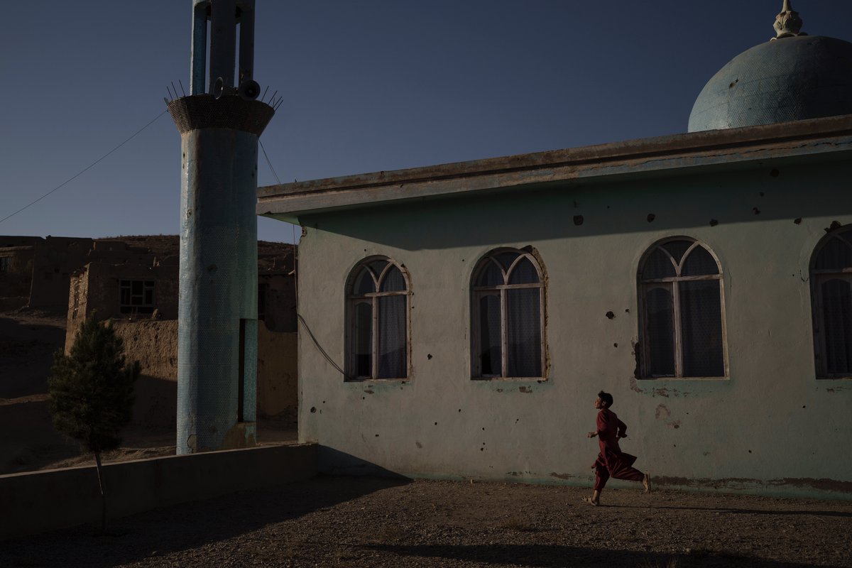 Children playing in villages heavily damaged by years of conflict in Wardak province, Afghanistan, Oct. 2021. <a href="/AP/">The Associated Press</a> <a href="/felipedana/">Felipe Dana</a>