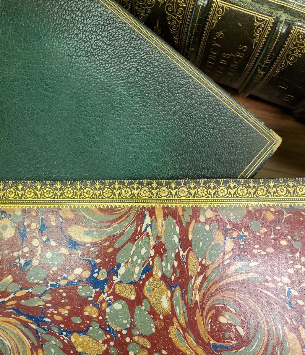 Happy #MarbledMonday! Today we have the inside cover of Bishop Percy's Ballads and Romances, published in the late 1860s. In an unusual twist, the gilding detail on the inside cover is more intricate than that on the outside, more closely matching the spine than the cover.