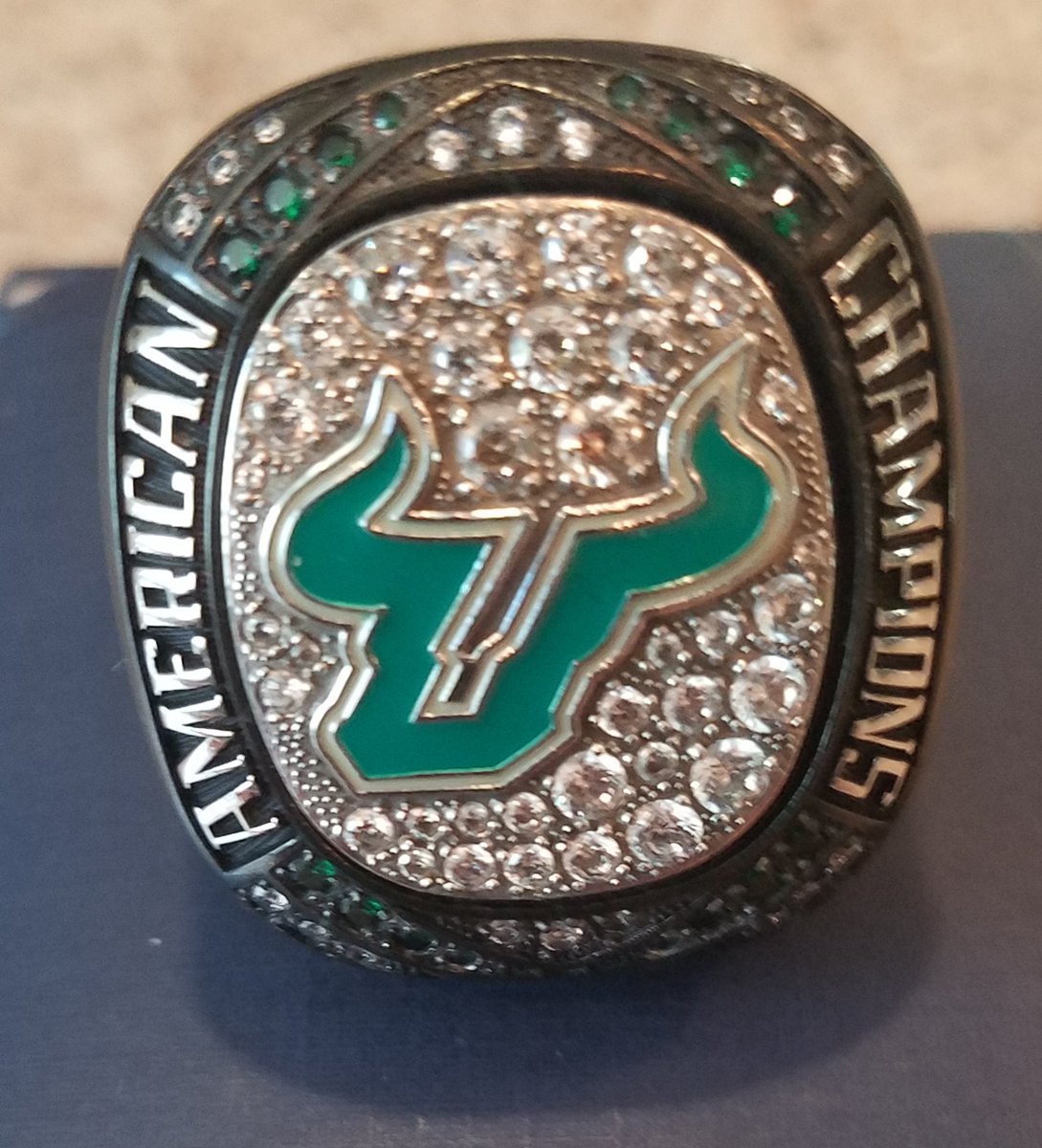NancyCarrow's tweet photo. @USF_CoachMohl came by our tailgate Saturday & gave us an AAC @USFBaseball Championship ring!! This is Keith's but I'm keeping it safe until mine comes in! It's beautiful; we'll treasure it always! Thank you! ππ€ππ» #KC #HornsUp #CarrytheBoat #PickedLast #Bullieve https://t.co/NuiCk98Do4