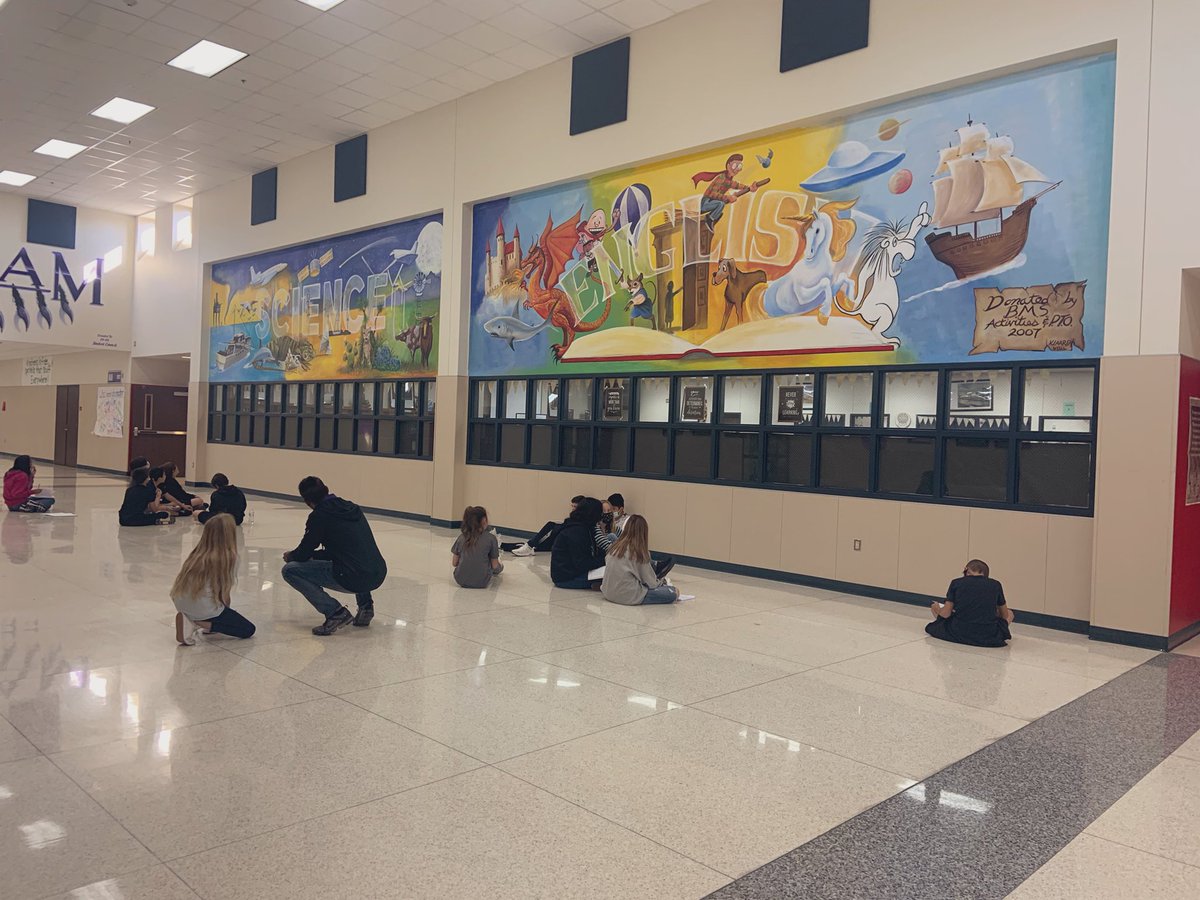 6th grade students <a href="/WISDBrabham/">Brabham Middle School</a>  using our beautiful school and murals as inspiration for writing figurative language!