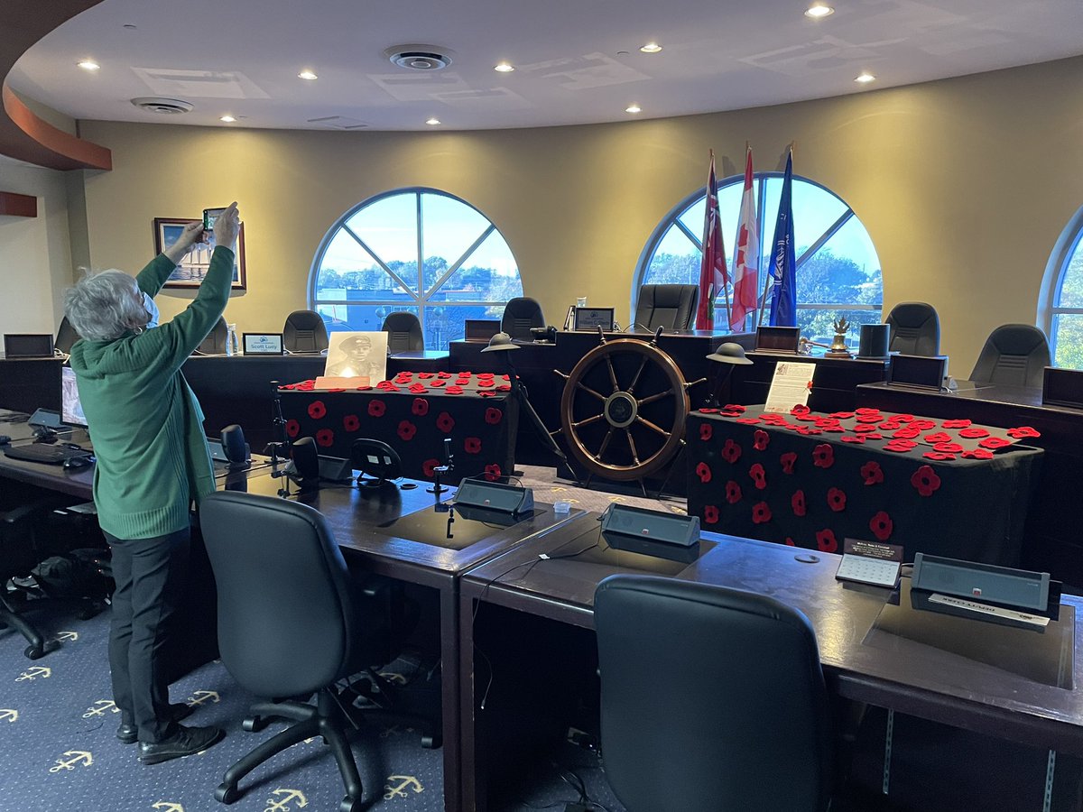 Mayor Bill Steele gives a shout out to <a href="/nfmuseums/">Niagara Falls Museum</a> for the Poppy Partnership <a href="/PortColborne/">City of Port Colborne</a> Council. Museums of Niagara Association makes us proud.  Michelle Mason completes the display for tonight’s meeting.