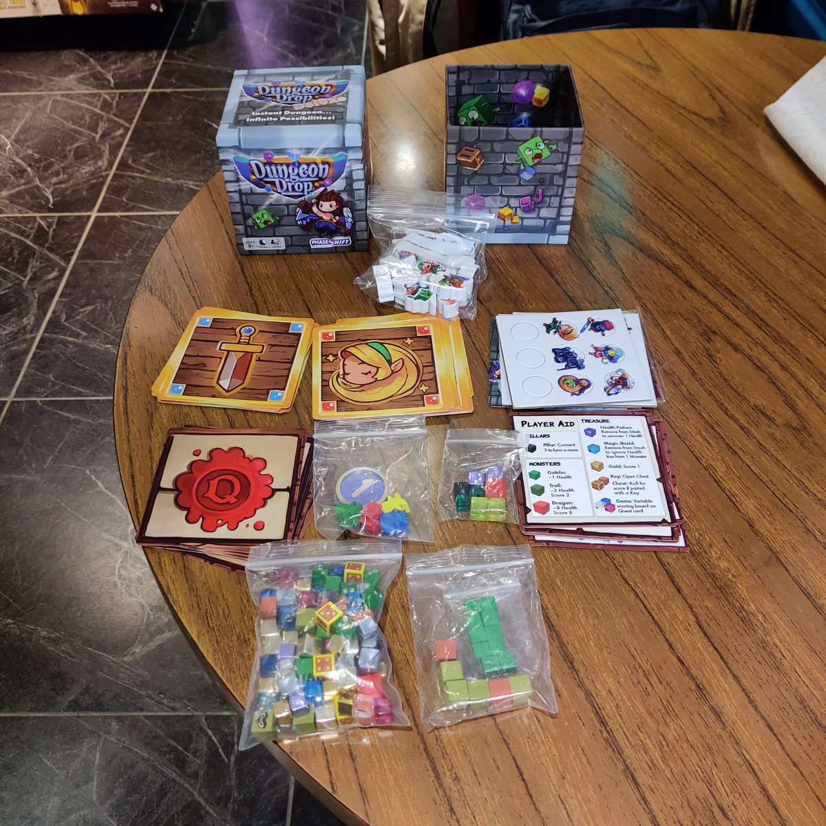 CafeBoardgameFI's tweet photo. The newest game of the week is Dungeon Drop Deluxe, an easy and fun party game. No advanced degree of ludology is required, but the game is likely to deliver a pleasant surprise. Come and try it yourself! 

https://t.co/94niOC4gid https://t.co/YQ18WiEyJr