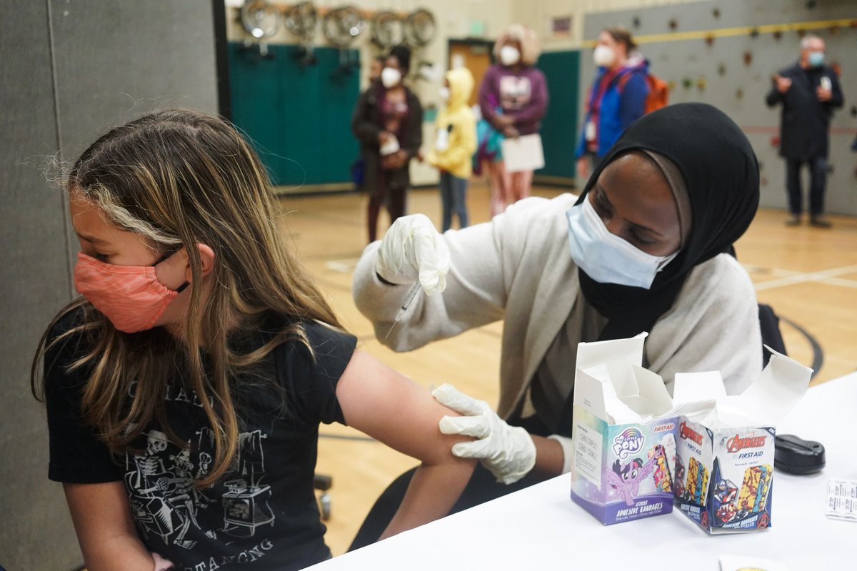 mattmillsphoto's tweet photo. The younger ones are finally getting vaccinated! // Some coverage for @reuterspictures of @SeaPubSchools' first day of #COVID-19 vaccinations at school for kids ages 5-11, at Bailey Gatzert Elementary in #Seattle. https://t.co/s72I22OogD