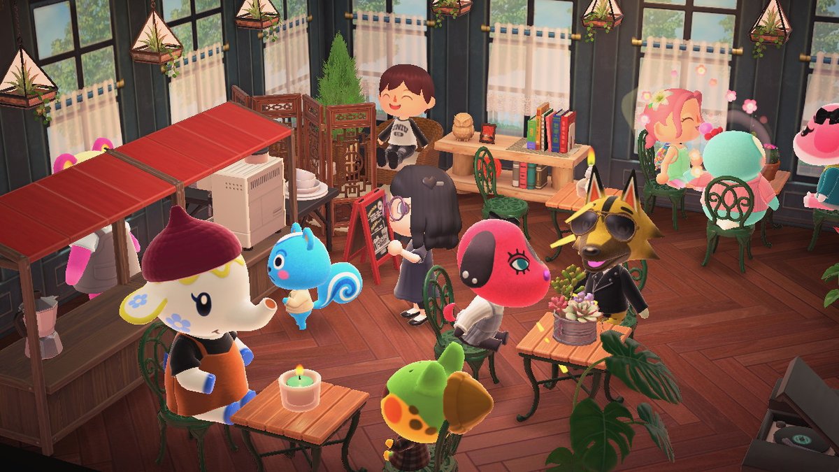 KatJax's tweet photo. The first set i ever made at photopia (may 2020) was a café. Finally getting to build a functional, cozy, real café in HHP made me a little emotional.
 #AnimalCrossing #ACNH #NintendoSwitch https://t.co/xupYO7jrjJ