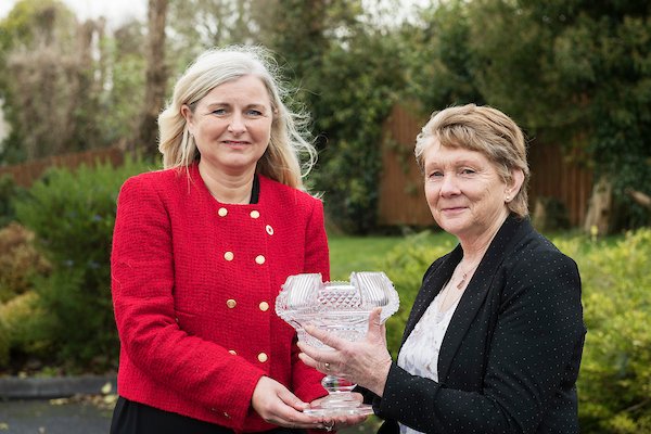 Catherine Corless receiving the IRC Humanitarian Awards Lifetime Achievement award for her work. (Image Credits: @irishredcross | X)