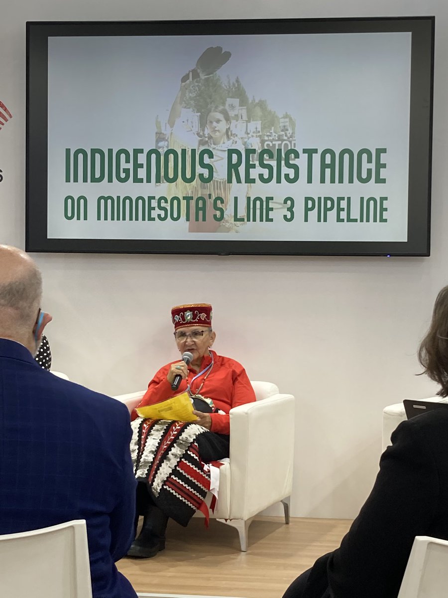 Great grandmother Mary Lyons teaching COP26 delegates how MN water protectors are moving from damage to healing
