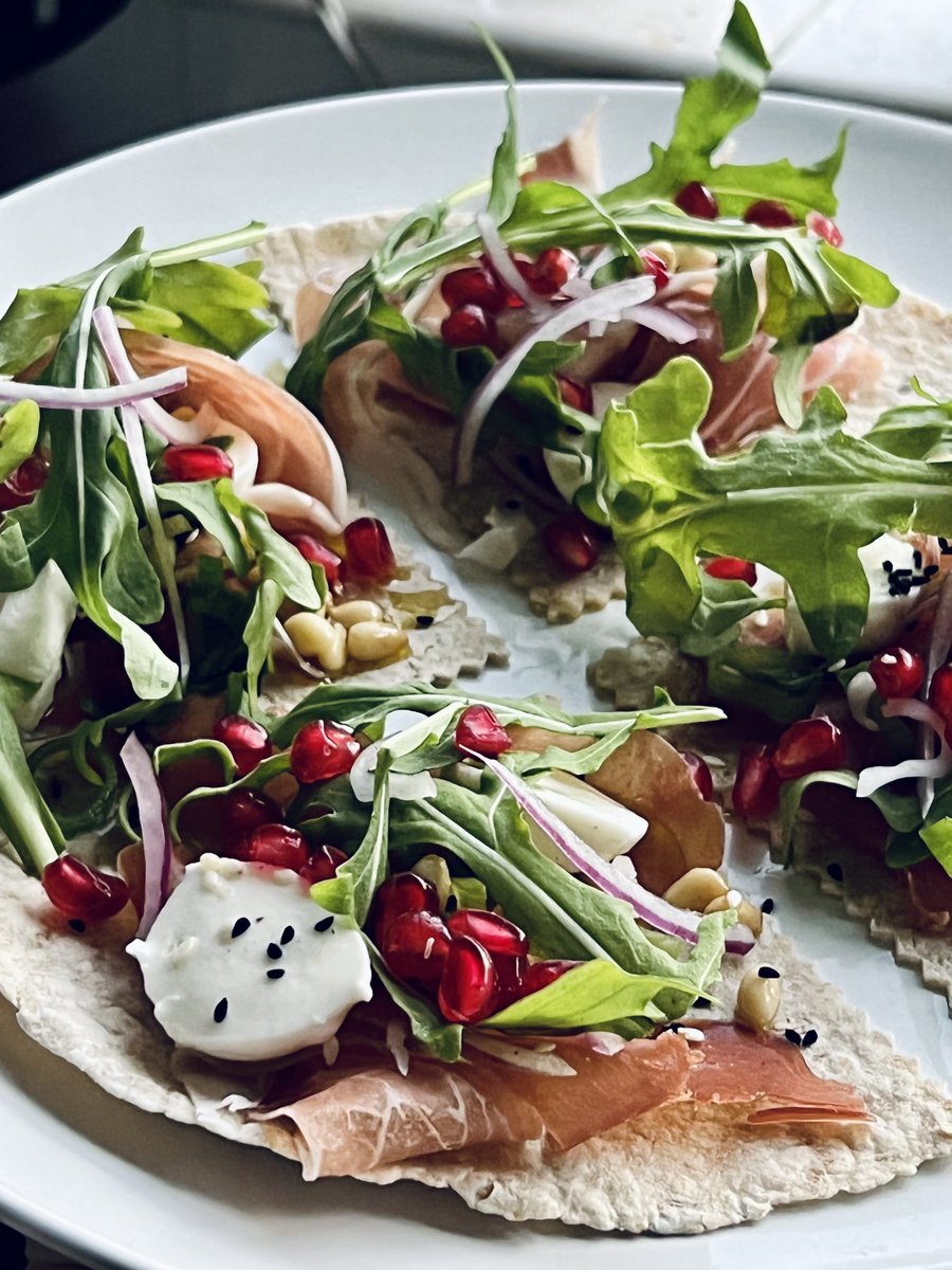 Not sure what you’d call this! An open wrap maybe? It’s prosciutto, ciliegene cheese, red onions, toasted pine nuts, rocket (arugula) and pomegranate. 

Use what’s in your fridge and get creative 💜 #fightfoodwaste