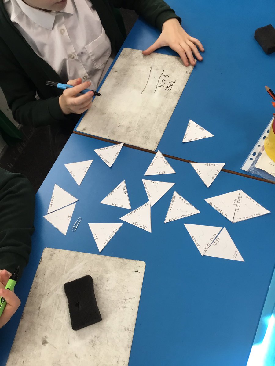 TGPS_NorthLincs's tweet photo. Year 5 are solving addition and subtraction calculations using tarsia triangles. #TGPSMaths #TGPSYear5 #TGPSTeamwork https://t.co/FLkvqsr6Pe