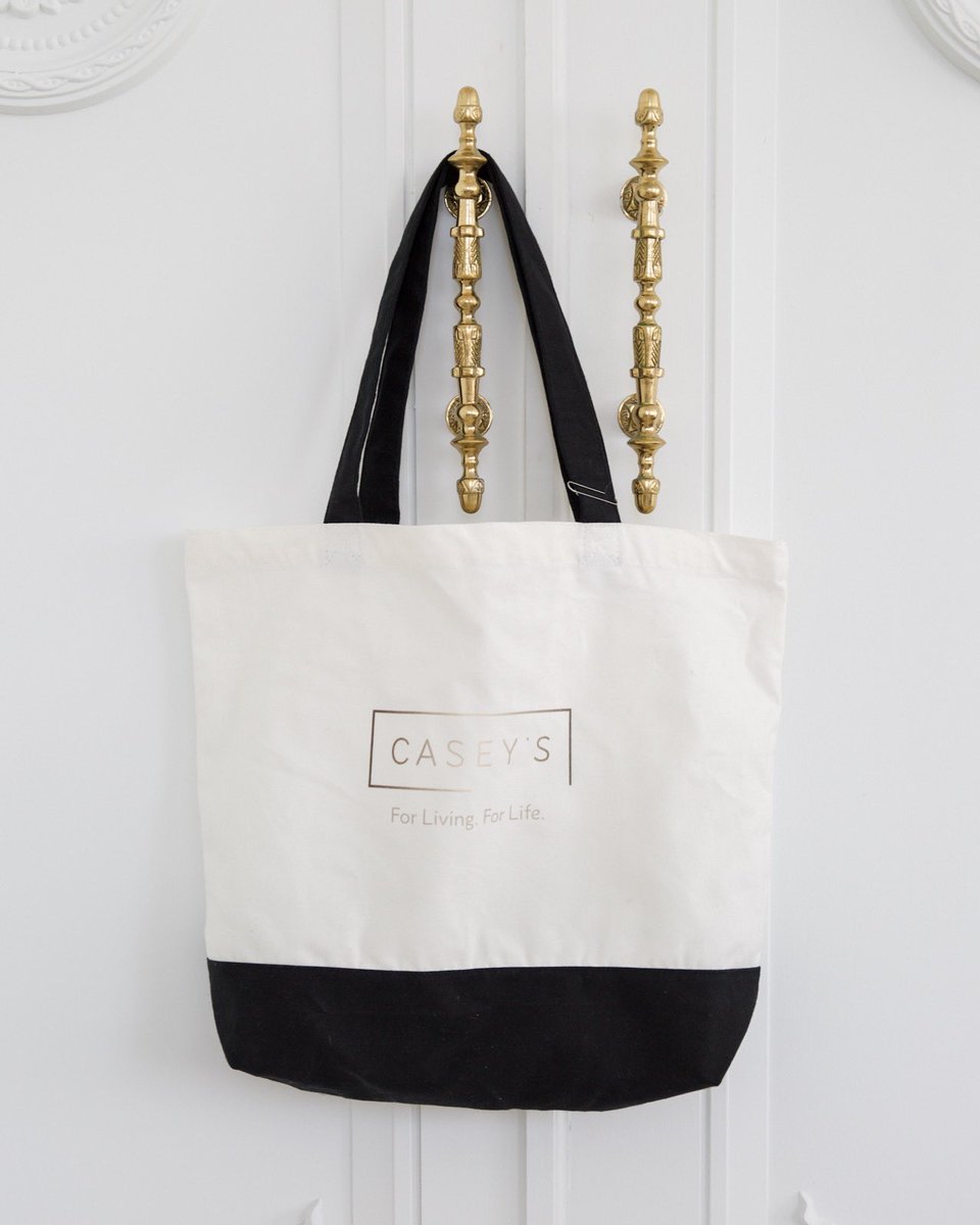 Pairs well with grocery shopping for your new kitchen. Who else tote-ally loves our branded bag? 😍🖤 #ForLivingForLife #CaseysKitchens #AllInTheDetails