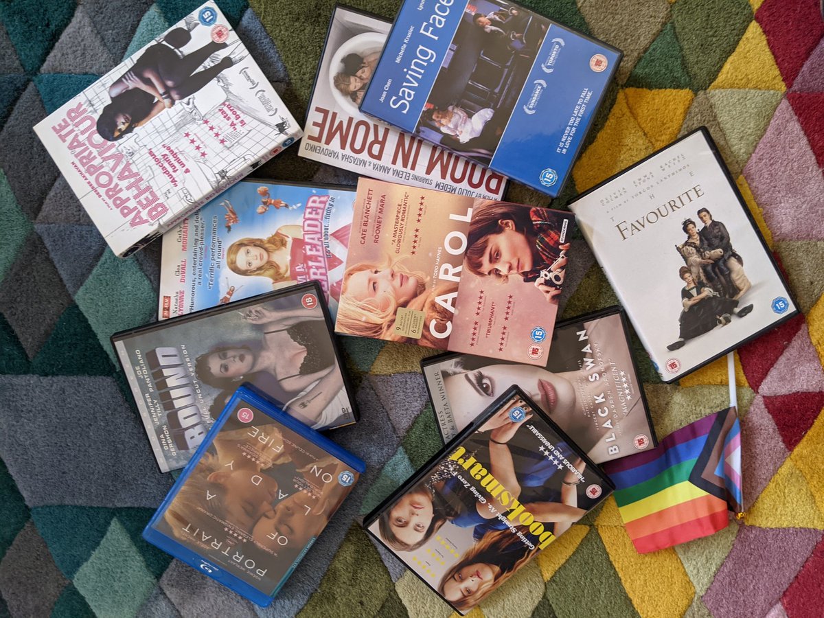 queergirlfc's tweet photo. Is it aesthetic to chuck your queer girl DVDs/Blu-rays on the floor for a photoshoot, or are you just a geriatric millennial with a podcast to publicise? #QGFC https://t.co/e8t0hcI1Kf