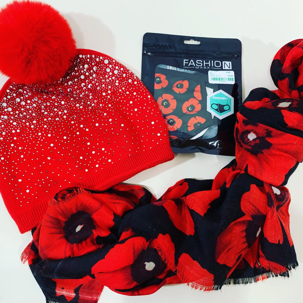 LibertyBluff's tweet photo. It’s nearly #remembranceday 🌹 if your heading out for the service this weekend why not add this amazing POPPY SCARF £14.00 and matching face cover £4.50 red hat £22 #shopnow https://t.co/MeDePXqEBG https://t.co/YugkH2XLOj