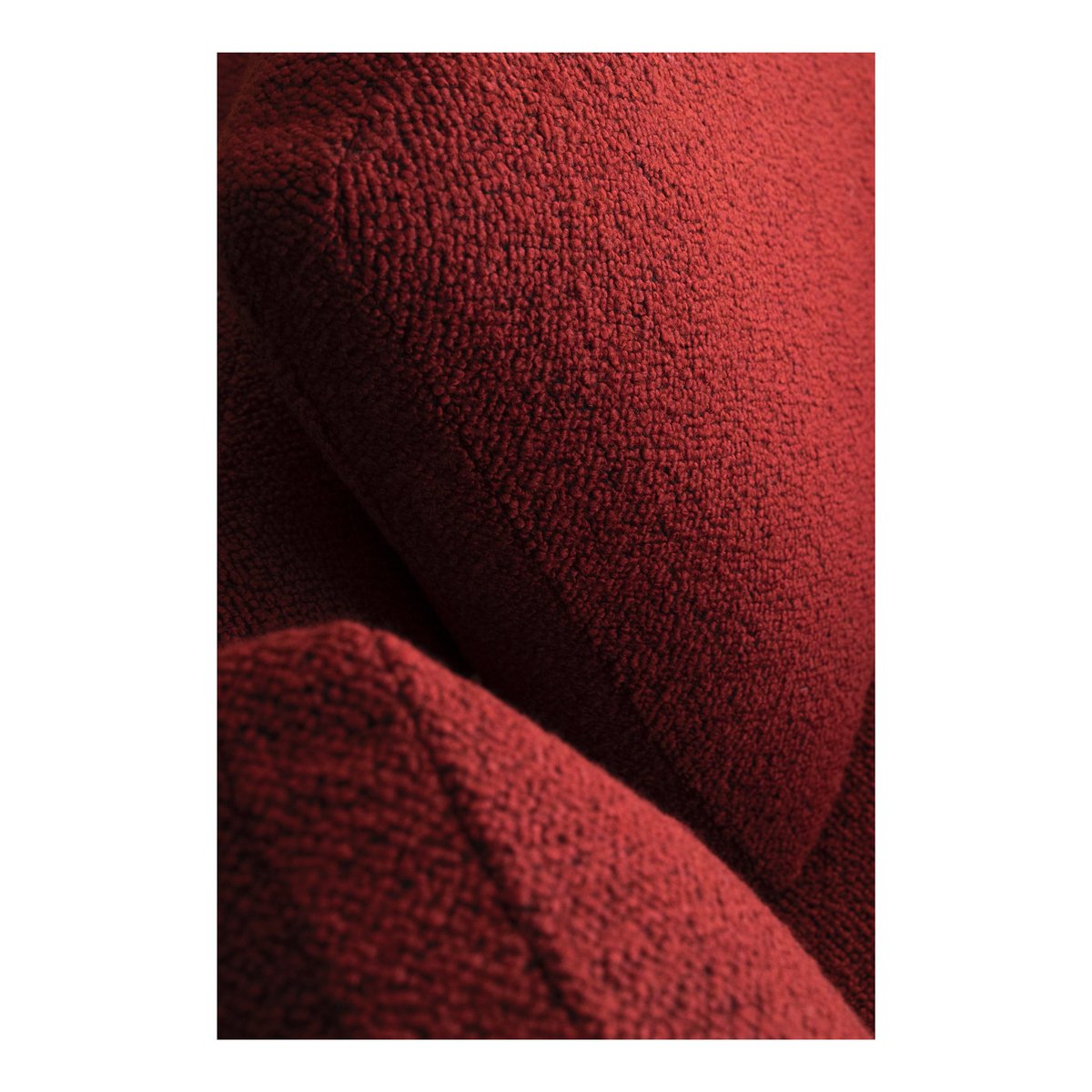 Visit our King’s Road Flagship Store to discover the brand new Saint Germain sofa system by Jean-Marie Massaud. Featuring a haute couture texture of red bouclé fabric, this sofa transforms any space into a warm and familiar setting, infusing a cosy feeling of home comfort.