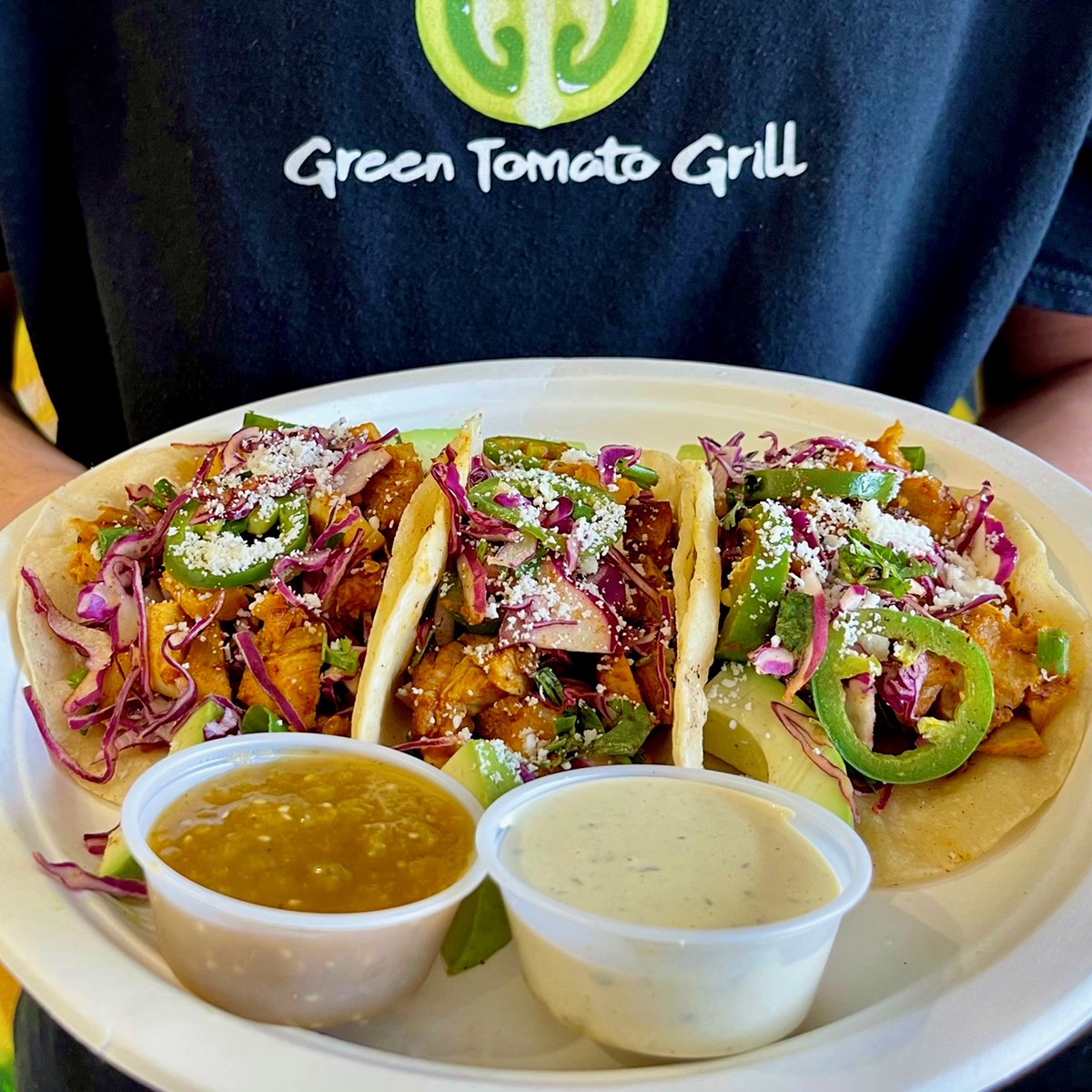 GreenTomatoOC's tweet photo. Happy #tacotuesday 🌮✨
Stop by and try our new Spicy Chicken Tacos 😋🌶️
~
Three blackened chicken tacoswith fresh avocado, cabbage slaw, jalapeno, cotija cheese, in corn tortillas
Served with chipotle ranch and habanero fire 🔥
~
#greentomatogrill #ocfoodie #smallbusiness https://t.co/kkxn7IQKyK