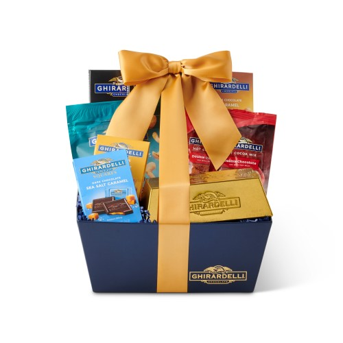 Ghirardelli's Signature Chocolate Gift Basket is a chocolate lover's dream. Brimming with best selling assorted chocolates, this gift basket includes hot cocoa mix, caramel sauce.