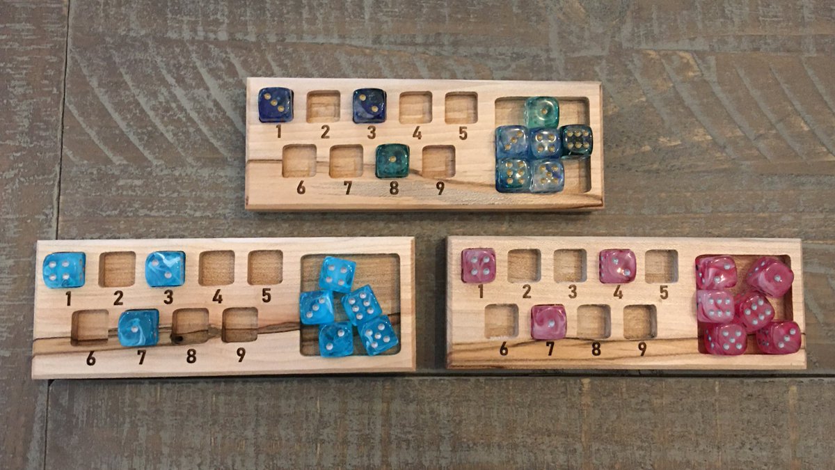 stephenswworks's tweet photo. Restocking Spelltrackers. Here are three Ambrosia Maple beauties. Up on Etsy. First buyer gets their pick. These always come with free dice and free US shipping. All the dice in this photo glow in the dark. #dnd5e #spelltracker #dice https://t.co/K2M6eEpeEc