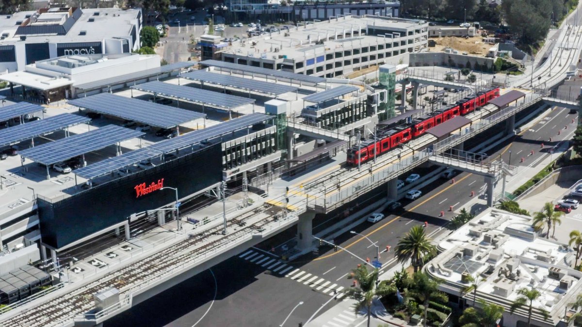 SANDAG's tweet photo. The Mid-Coast Extension of the @UCSanDiego Blue Line Trolley starts service in less than 2 weeks! We’re celebrating with @sdmts at @Westfield UTC today from 11-1 📅 to thank the community for their patience during construction. #MidCoastMilestone https://t.co/6g0aylaS4Y