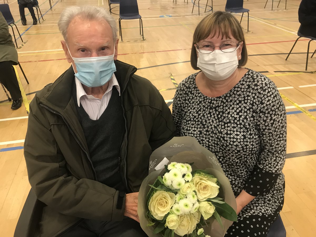 AneurinBevanUHB's tweet photo. Meet Lesley and Helen- the recipient and immuniser of our ONE MILLIONTH dose of the Covid-19 vaccine!

Les, 85, came to Cwmbran Stadium for his Booster dose this evening with his daughter. Senior Nurse, Helen, was delighted to give the millionth dose to Les 💉 https://t.co/jJ2COh9RMQ