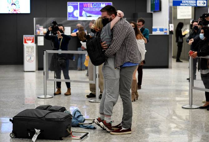MorningBrew's tweet photo. These pictures of people reuniting with loved ones after the US reopened its borders to vaccinated international travelers are heartwarming. 

Can't get enough of the hugs. https://t.co/0GBocMu9gR