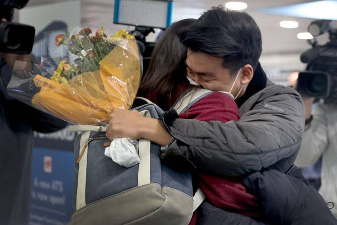 MorningBrew's tweet photo. These pictures of people reuniting with loved ones after the US reopened its borders to vaccinated international travelers are heartwarming. 

Can't get enough of the hugs. https://t.co/0GBocMu9gR