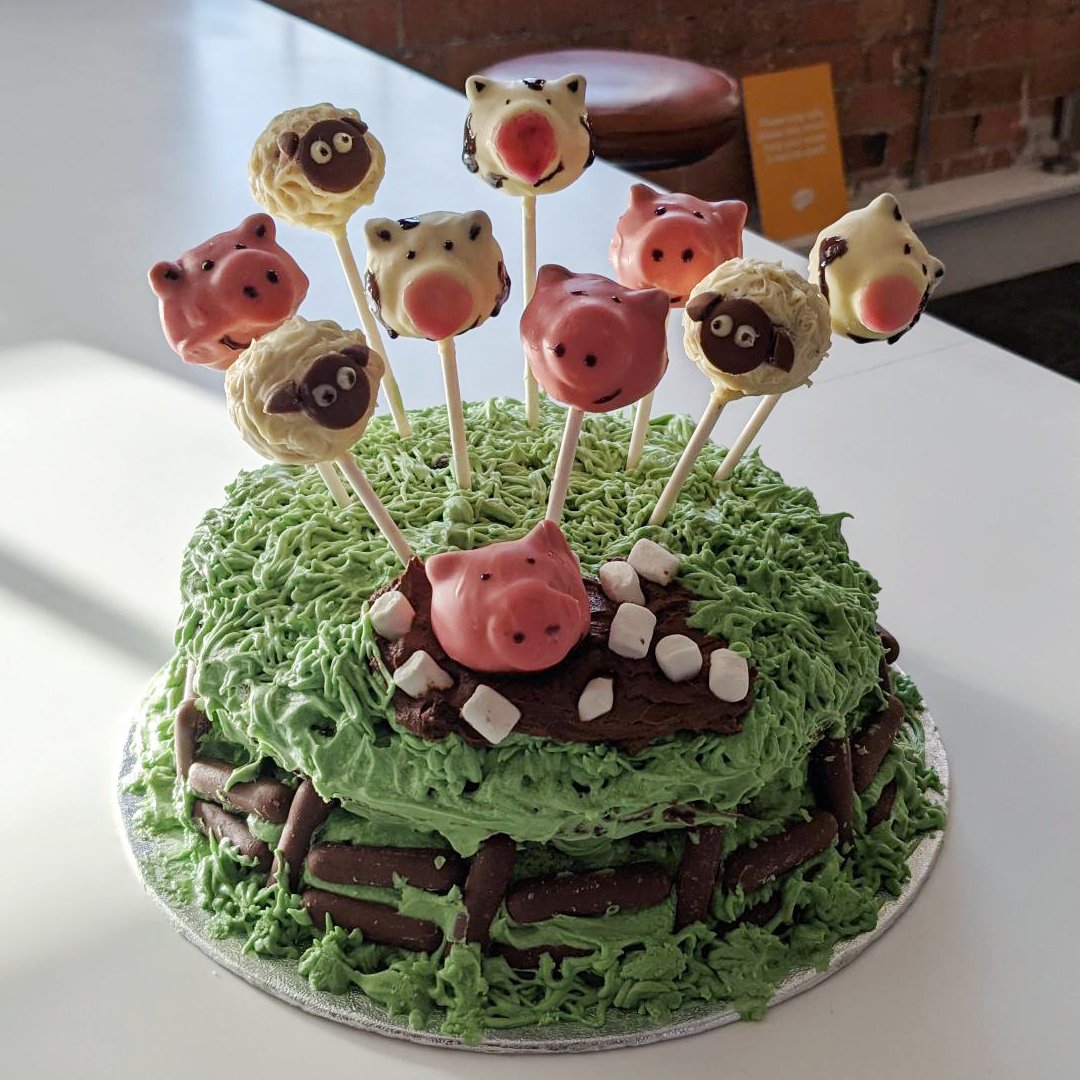 Is everyone excited for the quarter final of #GBBO tonight? We just have one entry for the Fluid Bake Off this week, and we think you'll agree that it looks totally a-moo-zing! 🐮

Vanilla and Chocolate Farmyard Cake and Cake Pops
by Anneliese