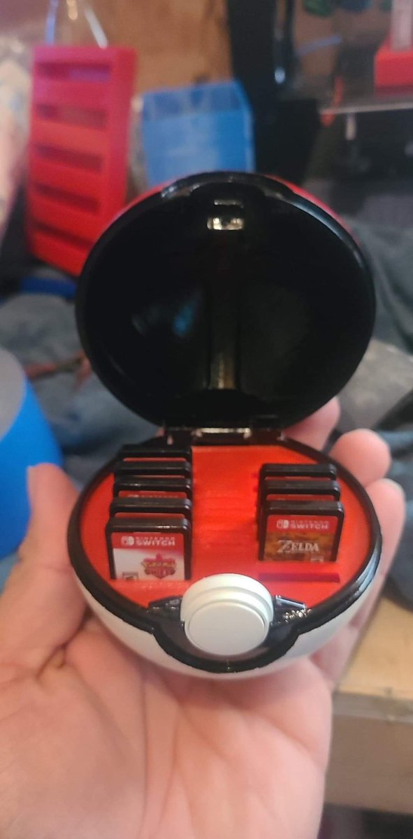Jesse3d's tweet photo. You can put all your favorite #NintendoSwitch games inside this #customizable #PokeBall, what’s everyone’s favorite #Pokemon game? #gaming #3Dprinting #nerdy #videogames https://t.co/ppcIOxlv7j