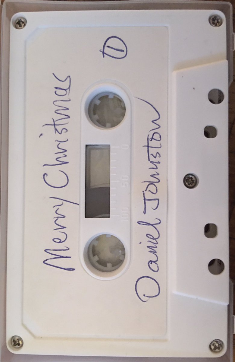 mabooshi's tweet photo. Sorting thru an old box of archived #cassette tapes (mostly Xmas), I came across some real treasures…among them was THIS gem I’d forgotten I owned 😍🎶🎸🥁🎹🎅🏿👏❄️✨🙏🏼
#RIPDanielJohnston #ALTXmasMusic
#Autographed #XmasInTheLoonyBin https://t.co/fu6QBkhPB6