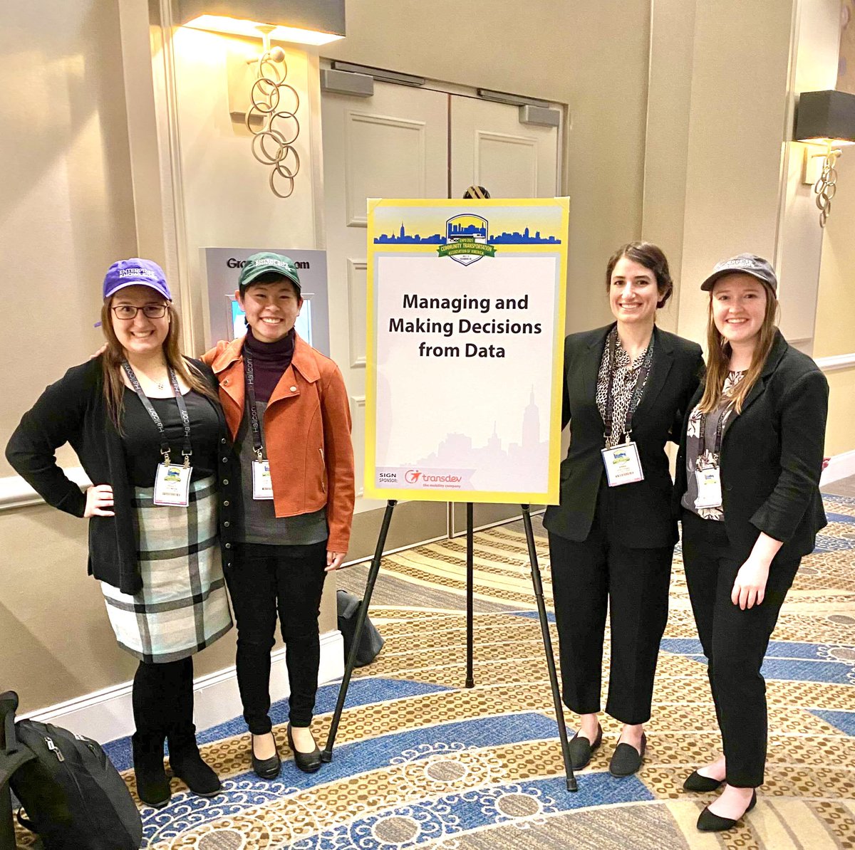 BytesByHolly's tweet photo. The best way to celebrate my 1 year work anniversary at @EKConsulting: A team #ekhat pic and another with @TransitNCATT after we ran a successful full day workshop on all things #data at this year’s @CTAAEXPO! https://t.co/ZgO0TMvgoG