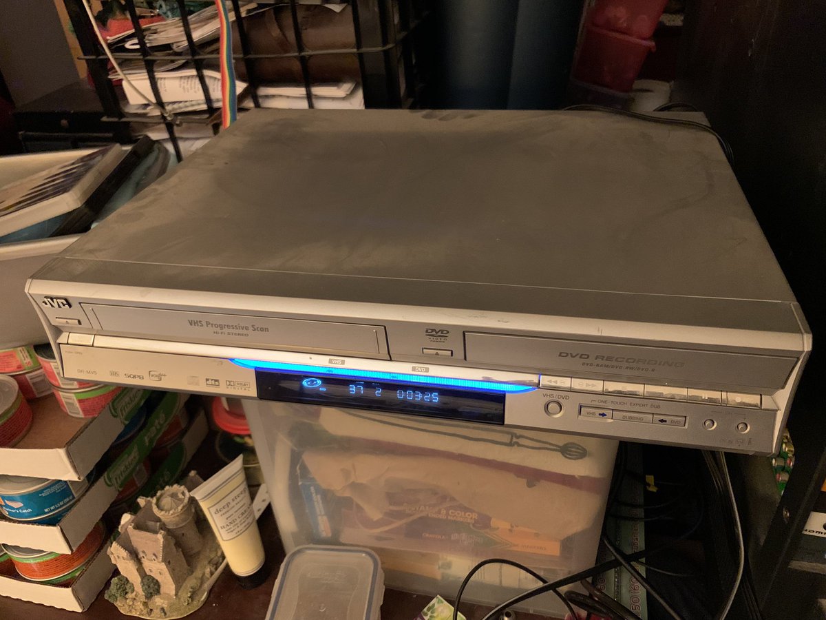 helgagrace's tweet photo. It’s a DVD movie date night! Here are pictures of the three increasingly large and ancient DVD players we tried to use, and the fourth (oldest, dustiest, and heaviest) that finally made our viewing possible 📀 @surlyspice #AMlife https://t.co/lHXAWY93nN