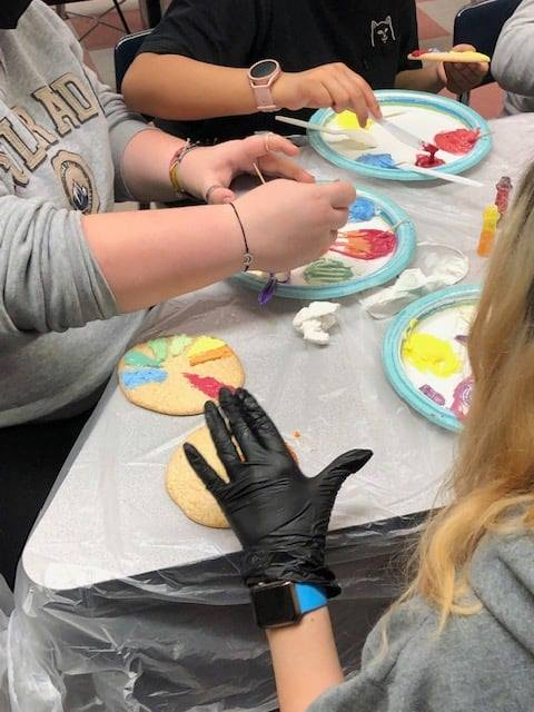 MaryFinley13's tweet photo. Students in @cherirock54 #cosmetology class are learning the #color wheel with a creative cookie activity! The color wheel features 12 shades with contrasting colors located across from each other. @mcscte #creativity https://t.co/4eMUMtJieG