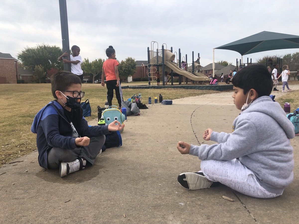 Practicing our calming strategies at recess!! Best buddies getting their calm on. #walstars #Kindergarten