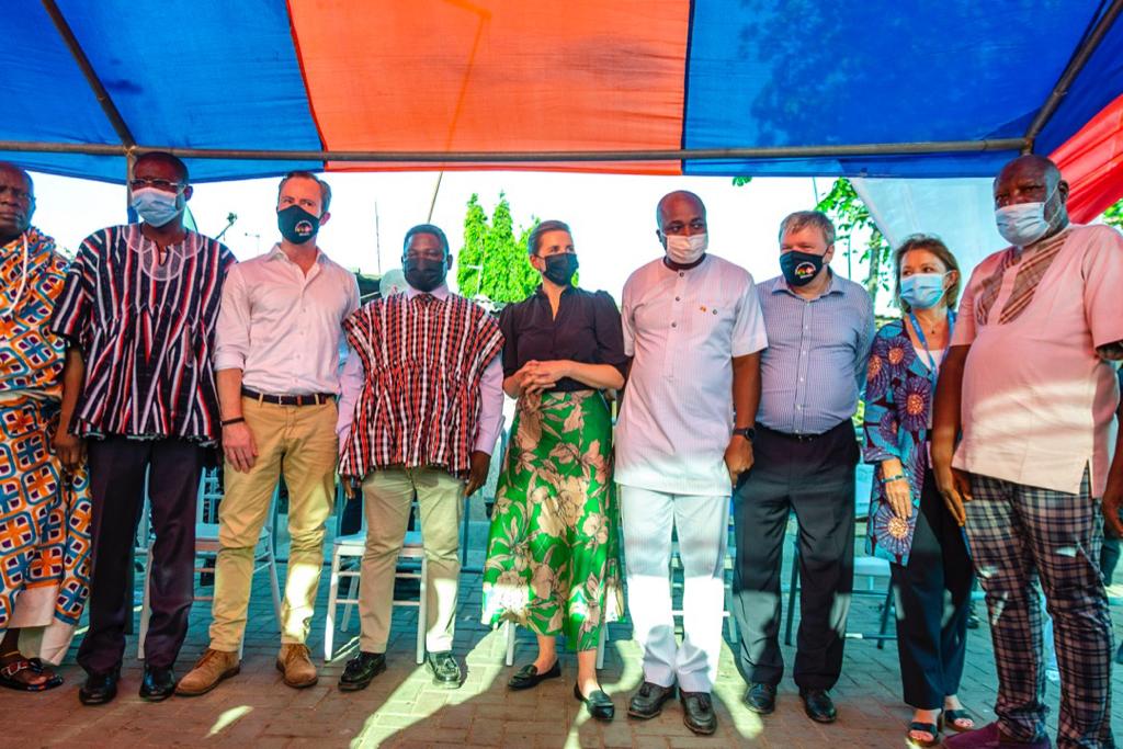 UNICEFGhana's tweet photo. Today, Prime Minister of Denmark Mette Frederiksen, Mr Jakob Ellemann, Ambassador Tom Norring, Ghana Government Officials and UNICEF visited a high density urban community in Tema. We cooperate closely to improve access to water, sanitation, hygiene, health and protection. 🇬🇭🇩🇰🇺🇳 https://t.co/5M6zCI6ern