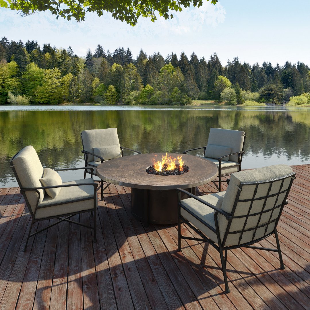 Ready to gather with family and friends. This cozy outdoor living space features Marquis lounge chairs and a Nature's Wood fire table. Browse our firepit collection here: bit.ly/3utA6IO